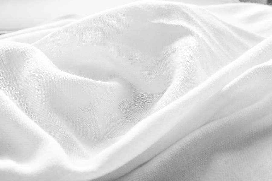 Folded white cotton fabric