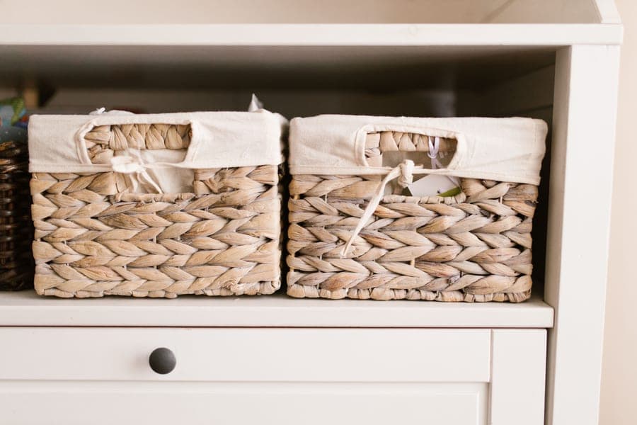 Fabric storage baskets on a shelf