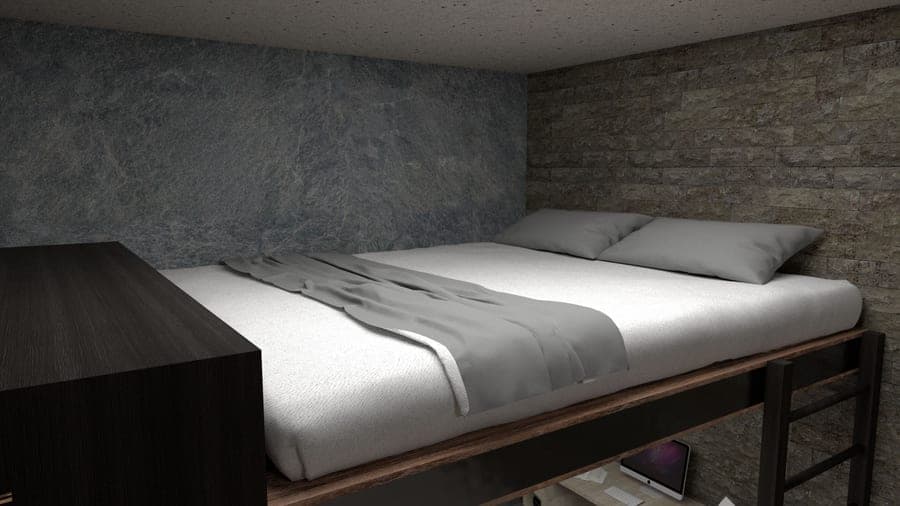 A metal-framed loft bed in a bedroom