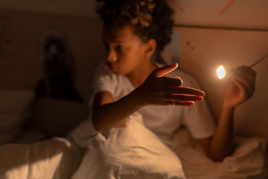 A soft night light glowing in a child's bedroom