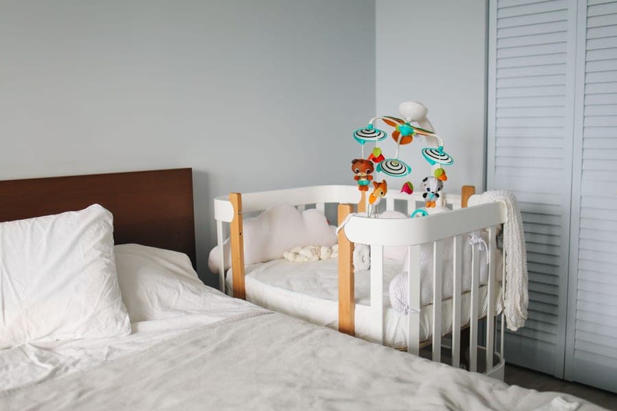A crib mattress in a nursery